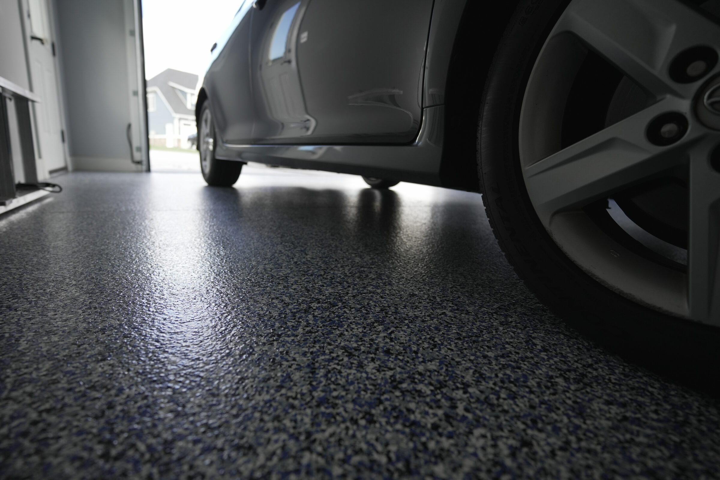 Professionally installed vinyl flake garage floor by GlassRock Coatings