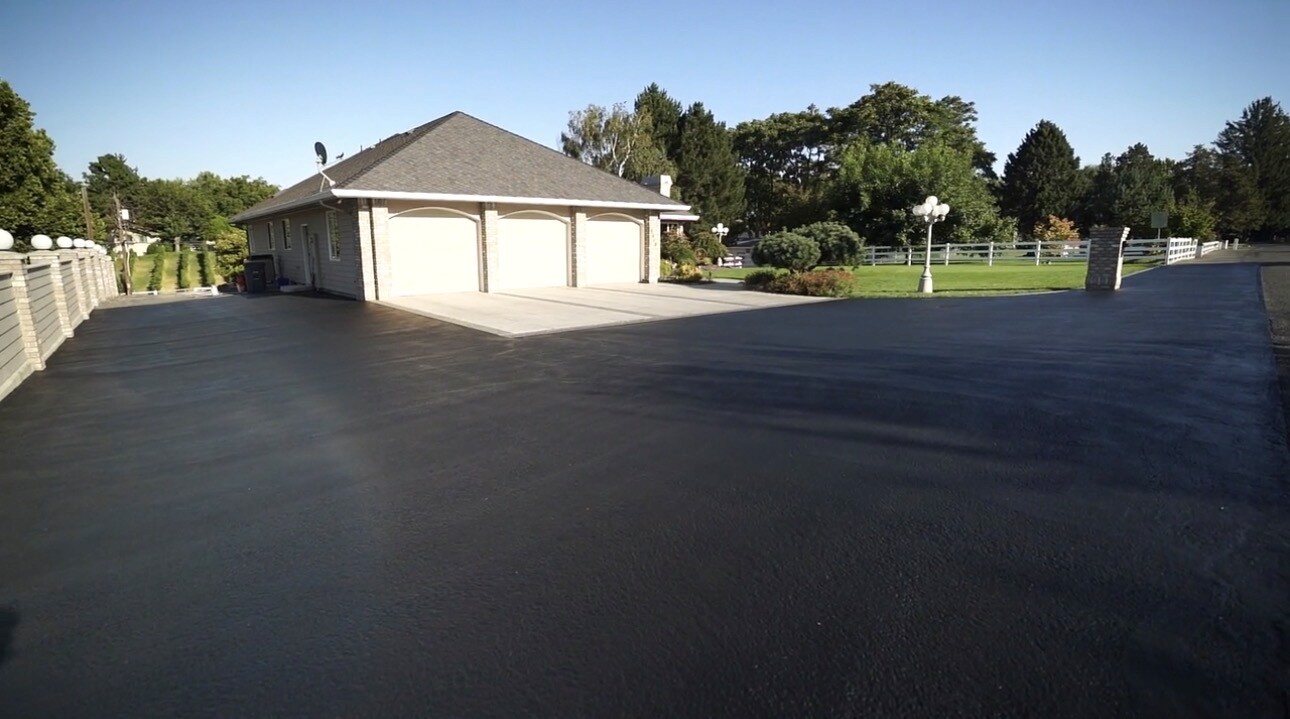 Completed asphalt driveway seal coat